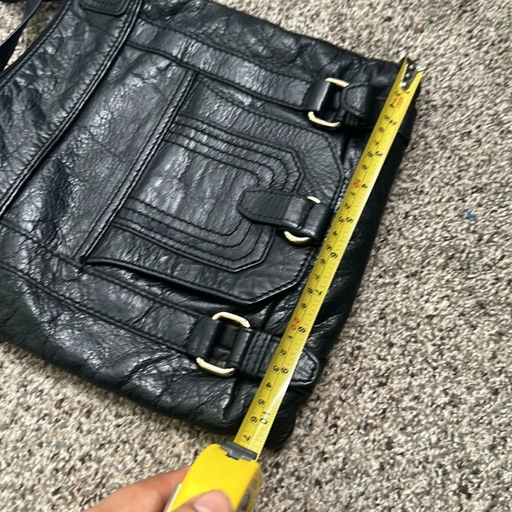 The Saks black leather cross body bag